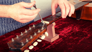 truss rod adjustment of an acoustic guitar