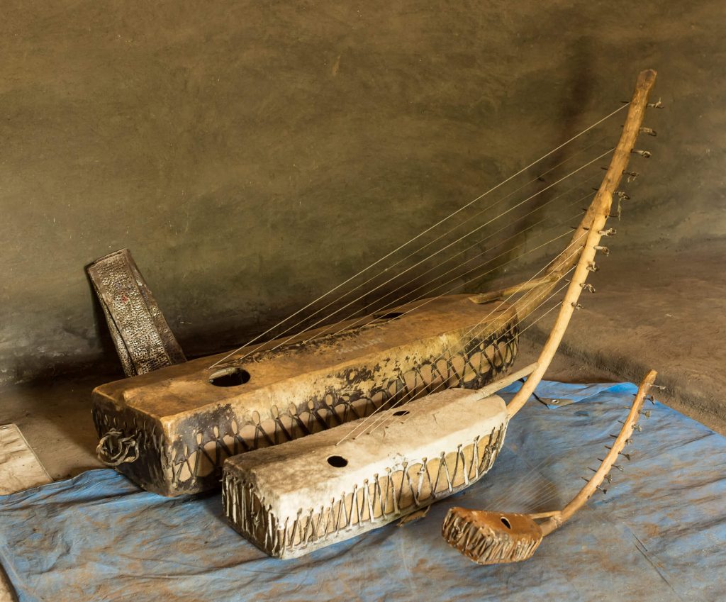 Three Adungu Harps Guitars