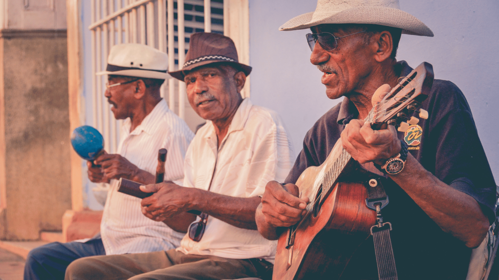 Guitar player with band