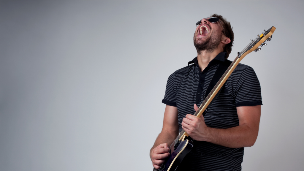 What Should I Practice on Guitar Every Day - guitar player