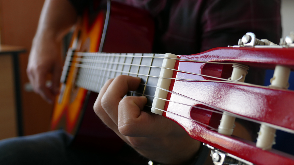 What Happens If You Practice Guitar 2 Hours a Day - guitar player