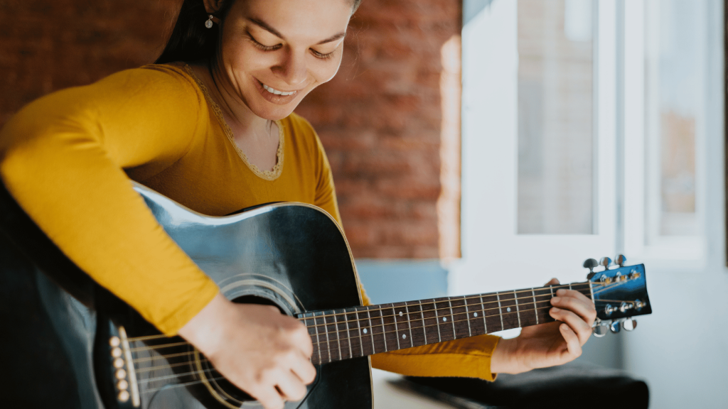 Guitar player with acoustic guitar