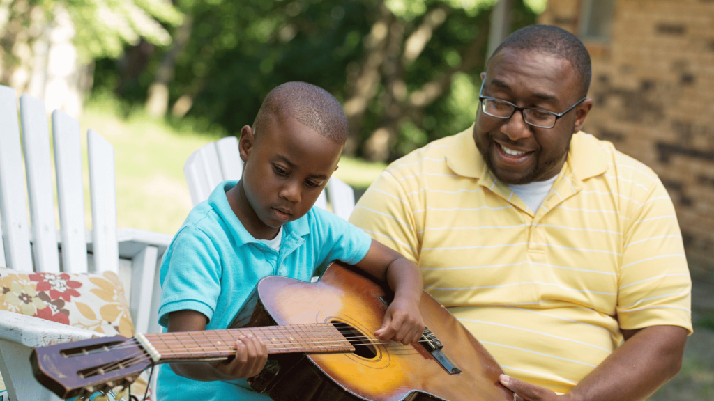 Father and son guitar player
