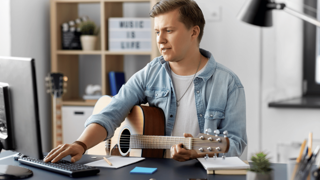 Guitar player online learning a music lesson