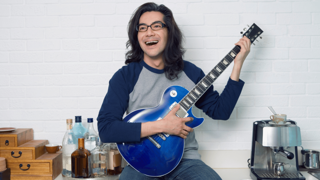 Guitar player playing an electric guitar