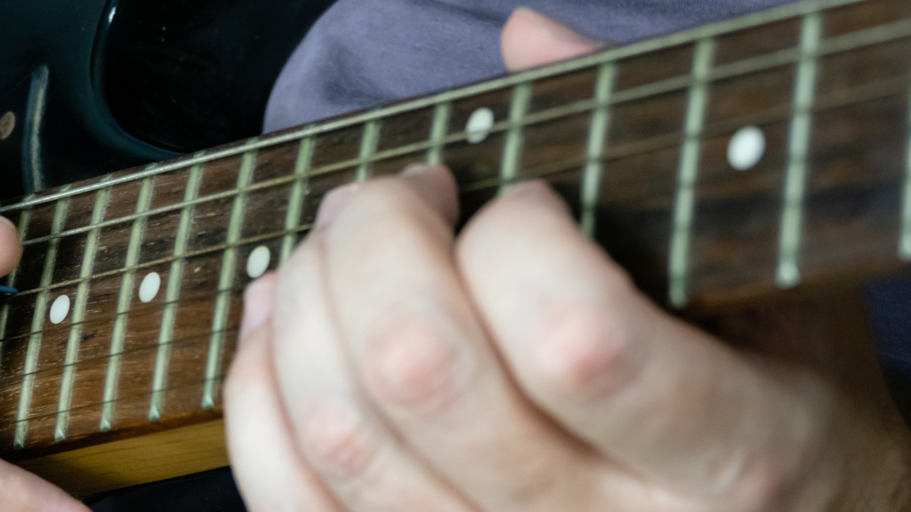 What is the Hardest Instrument to Play - guitar player
