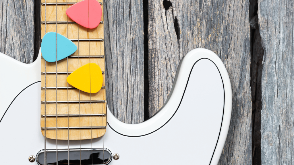 Electric guitar with picks in the strings