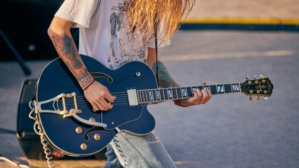 Guitar player with an electric guitar
