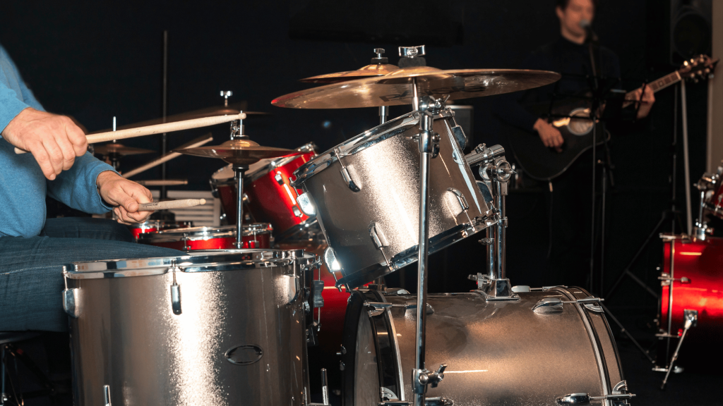 Drummer with drums on stage
