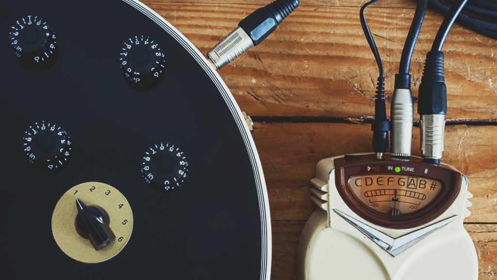 Guitar tuner pedal with guitar