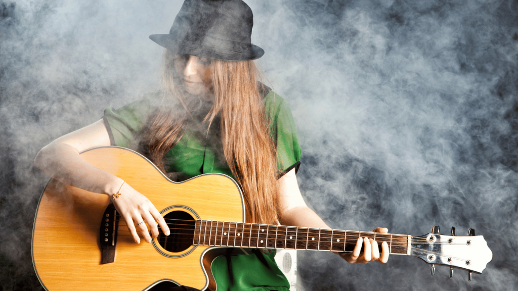 Guitar player with an acoustic guitar