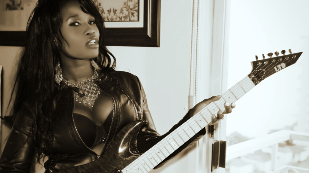 Female playing an electric guitar