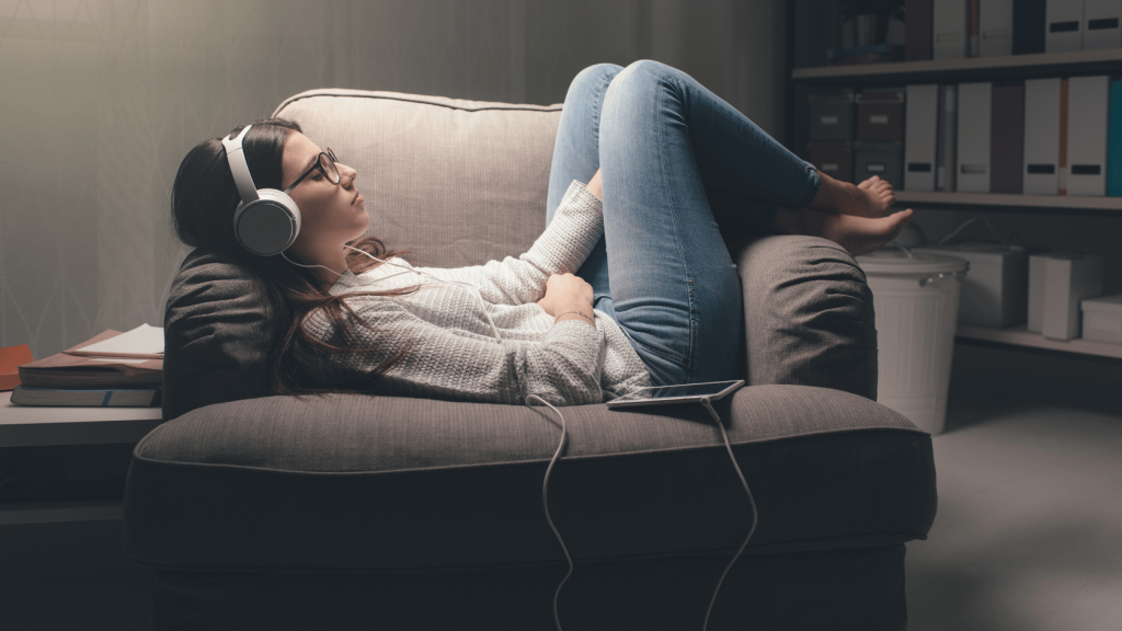 Person listening to music with headphones