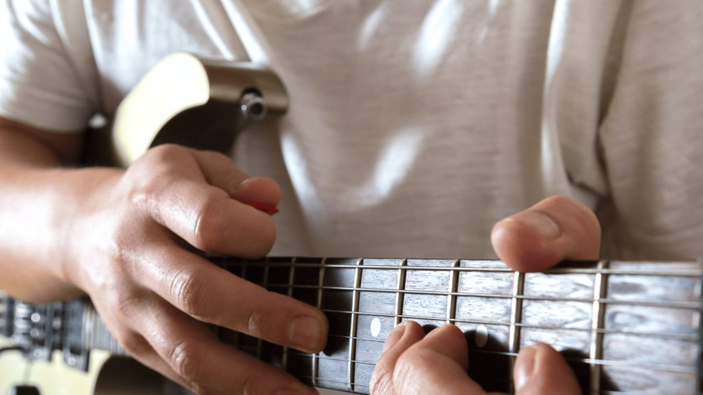 Guitar player tapping