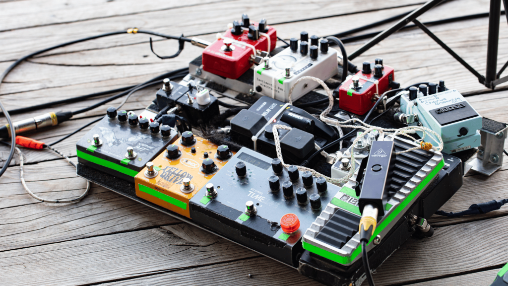 Pedal board with guitar pedals